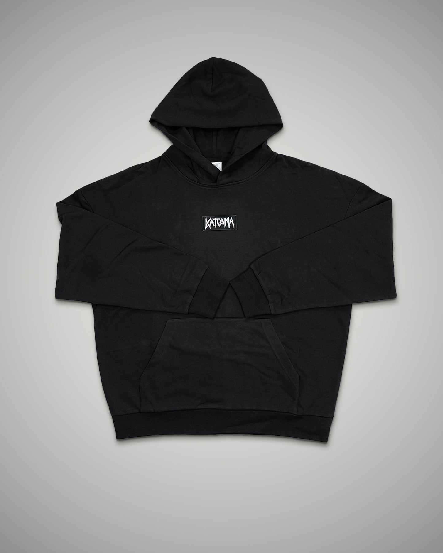 Black hoodie with a brand logo on a gray background