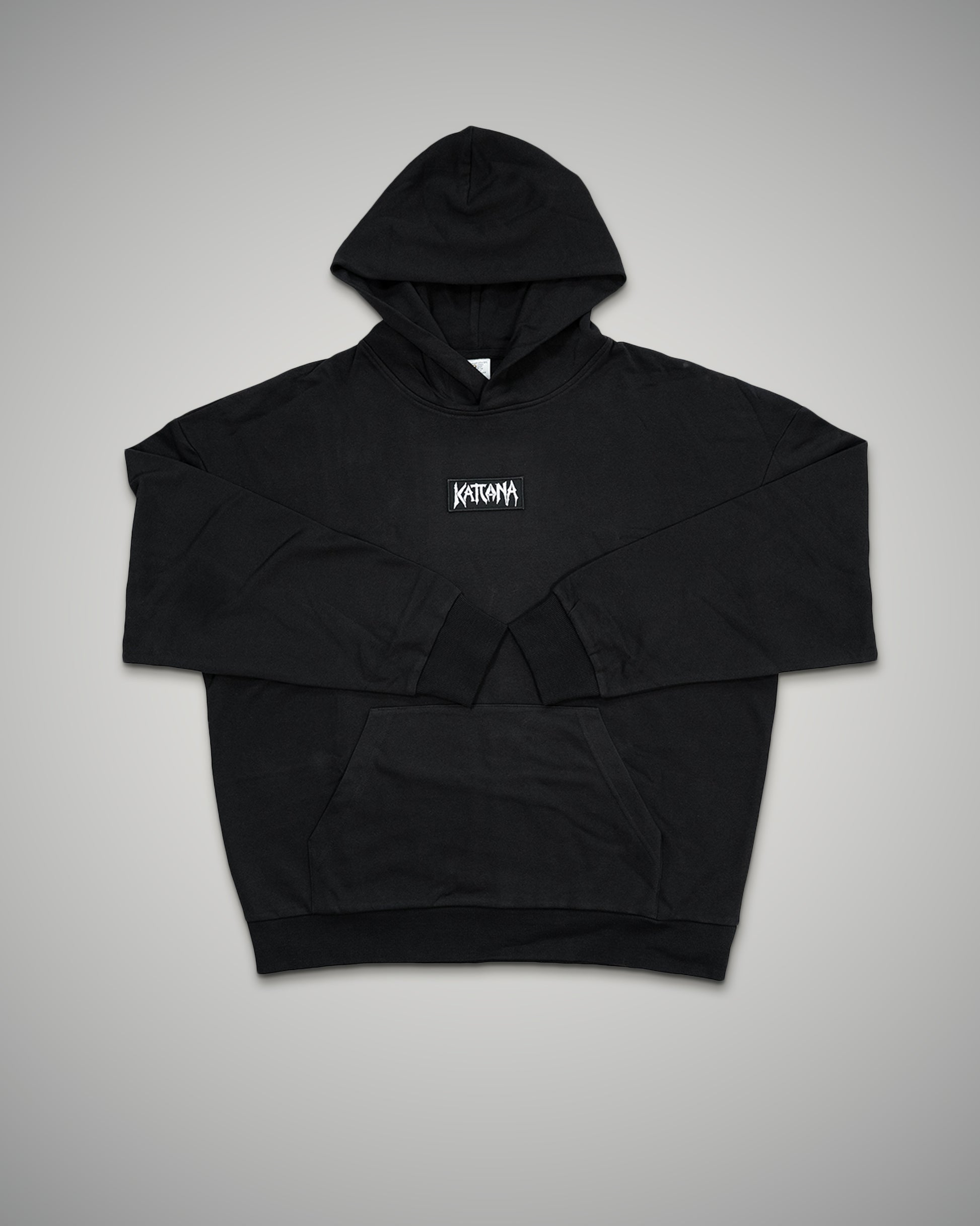 Black hoodie with a brand logo on a gray background